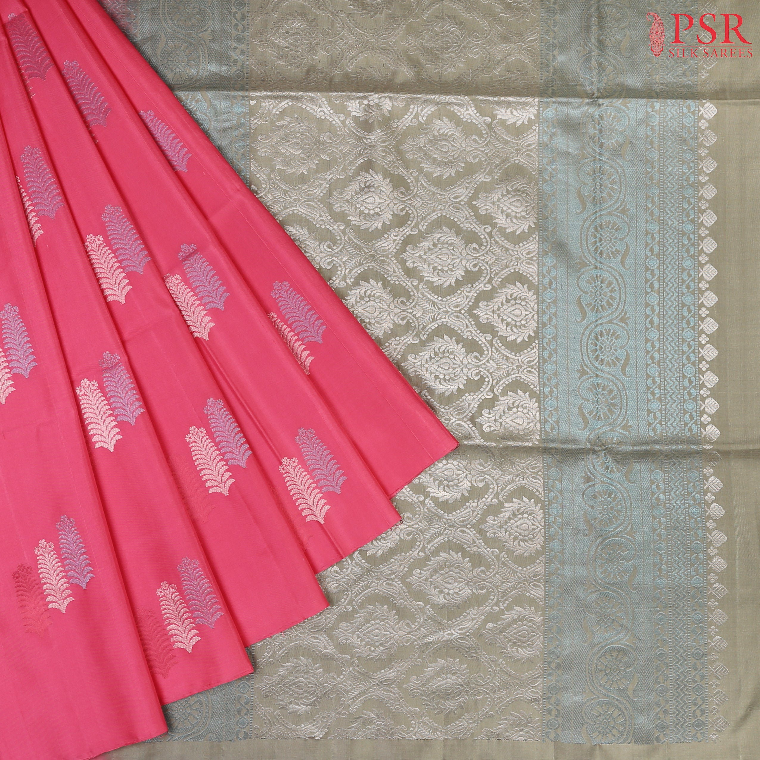 Presenting our exquisite Punch Pink Soft Silk Saree, paired with a sophisticated Dark Sage Green combination. This elegant borderless saree is adorned with mixed zari triple floral motifs, exuding charm and timeless beauty.