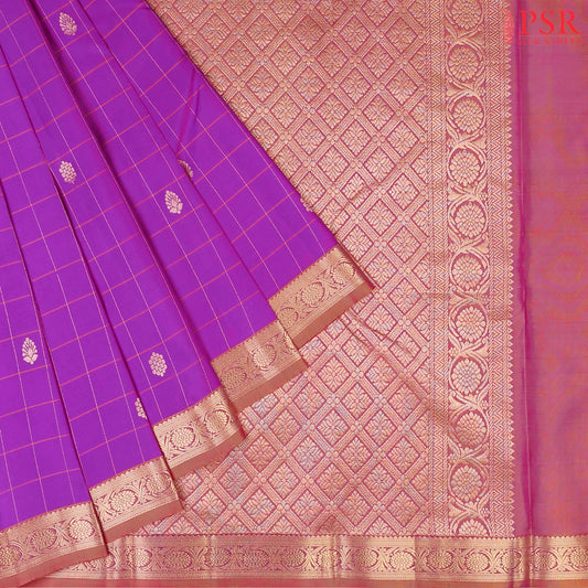 This Purple & Rosewood Brown Arani Silk Saree from PSR Silk Sarees is a refined blend of tradition and elegance.