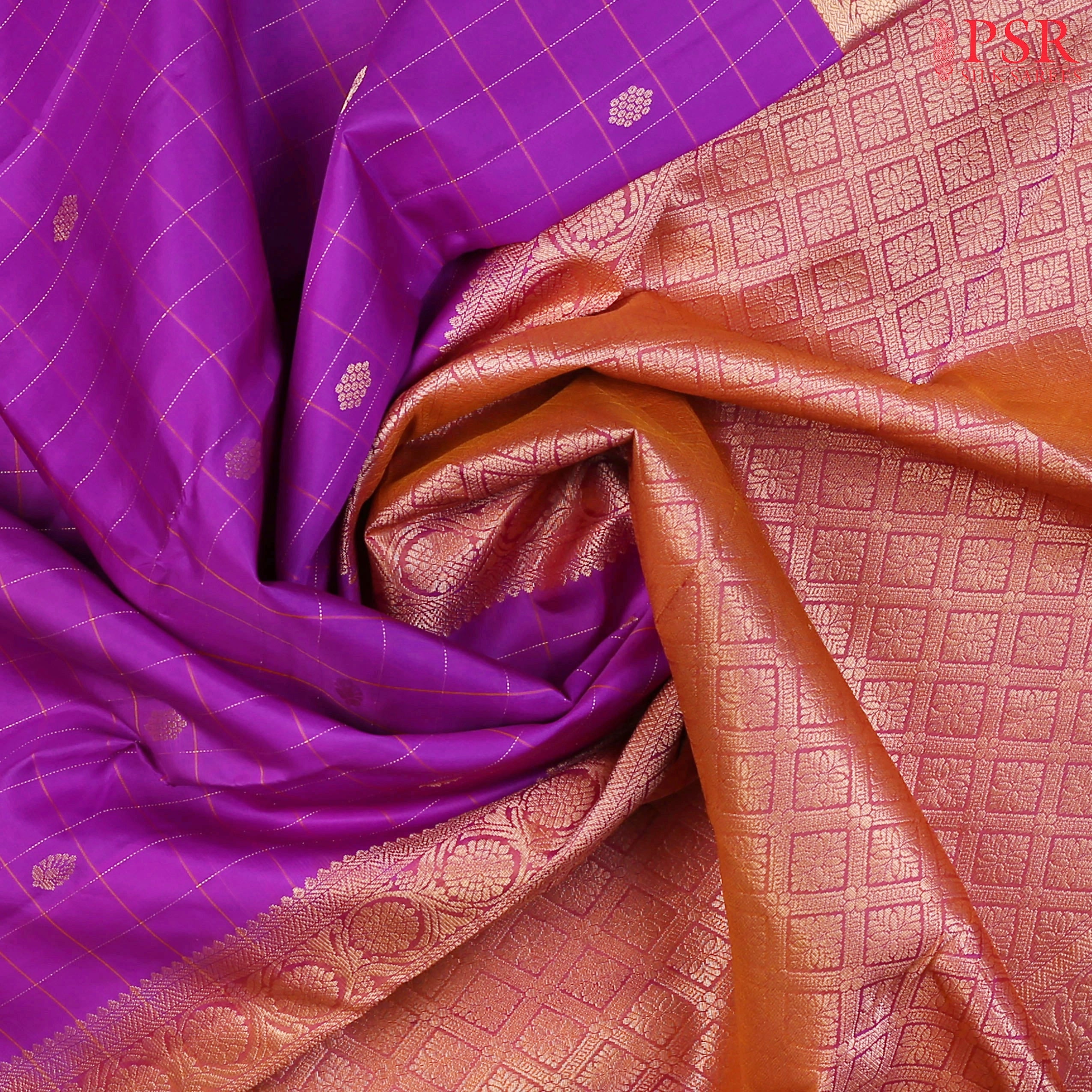 This Purple & Rosewood Brown Arani Silk Saree from PSR Silk Sarees is a refined blend of tradition and elegance.