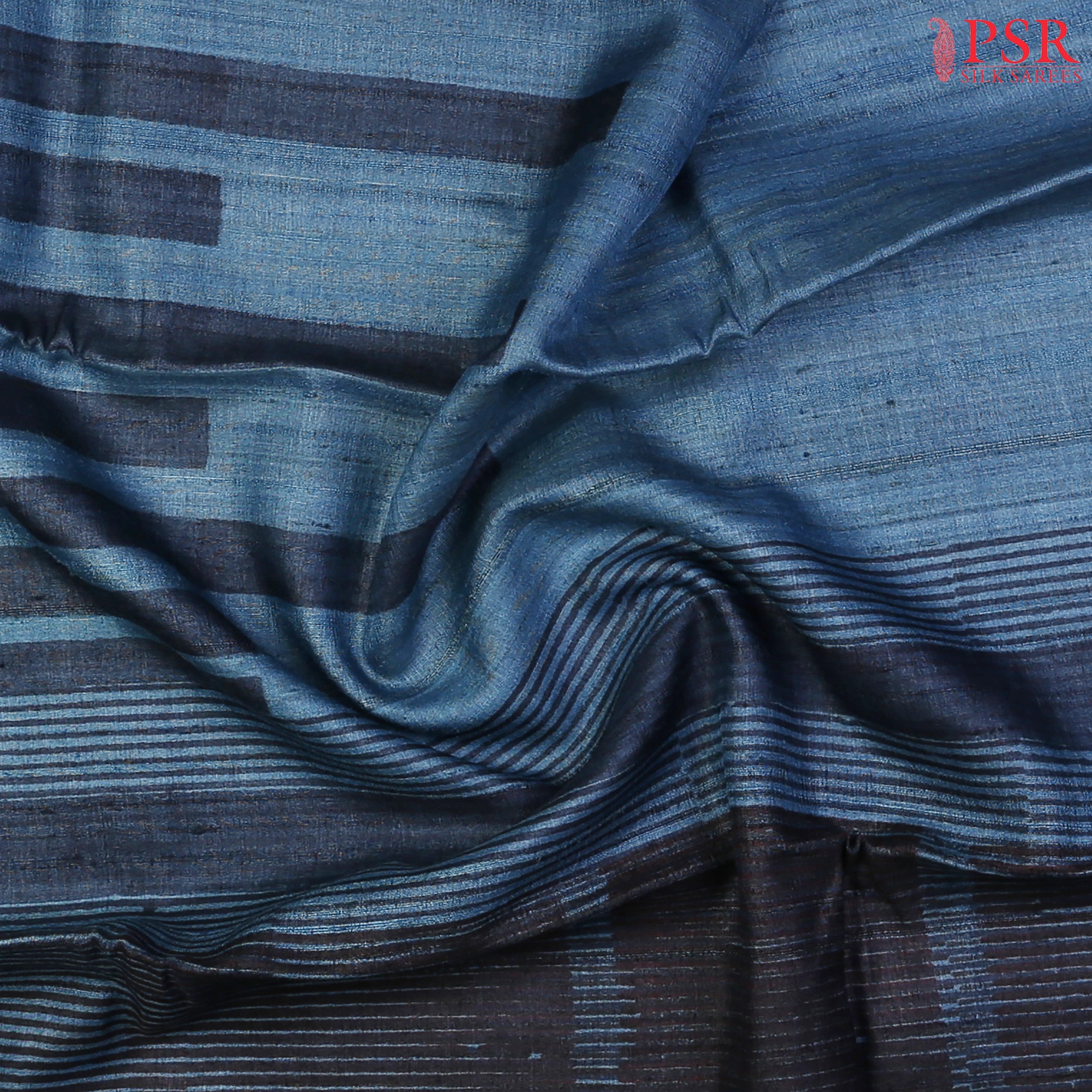 Queen Blue Kadhi Tussar Silk Saree with designer print work, scallop lace border, and matching plain blouse—an elegant fusion of tradition and modern style