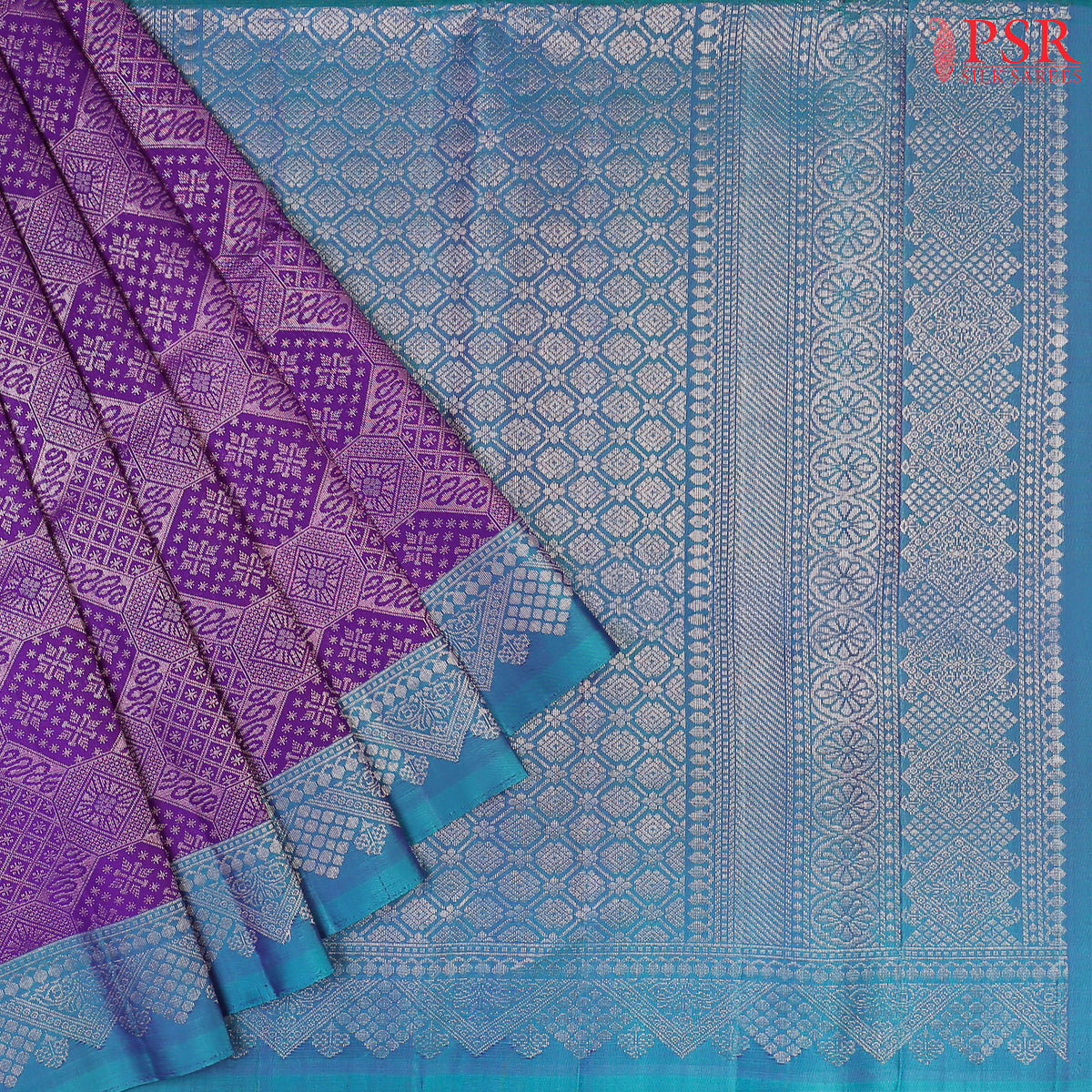 Embrace elegance with our Rebecca Purple&nbsp;Soft Silk Saree, exquisitely paired with a&nbsp;Peacock Blue contrast.