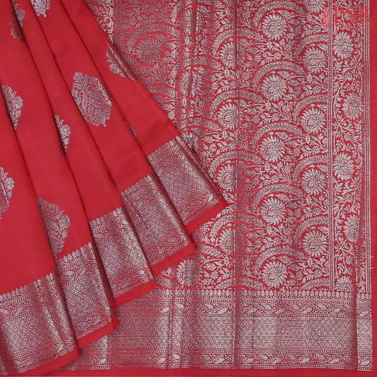 Red Chiniya Silk Saree, a timeless masterpiece adorned with silver zari floral brocade motifs. 