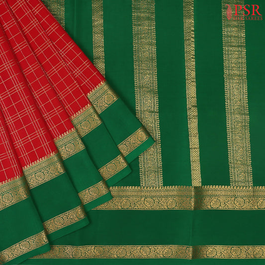 PSR Silks presents a Red colored Mysore Silk saree with combination of Emerald Green color.