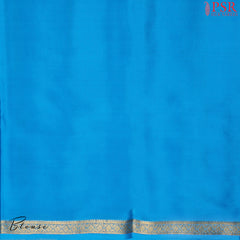 Indulge in the richness of PSR Silks' Royal Blue Mysore Silk saree, paired beautifully with a vibrant Cerulean Cyan combination