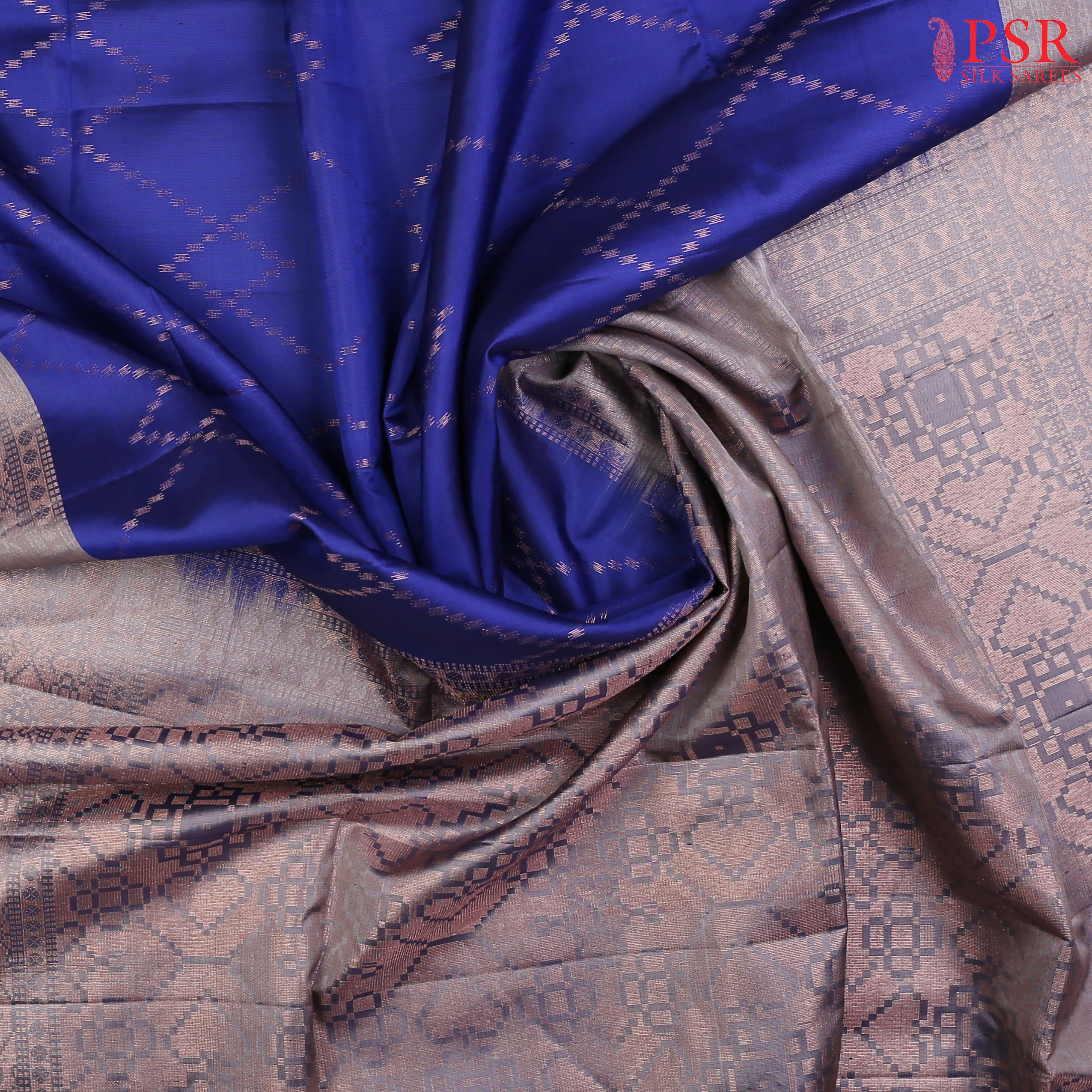 Indulge in elegance with our Royal Blue Soft Silk Saree, featuring a mesmerizing copper zari lattice pattern that adds a touch of regal charm.