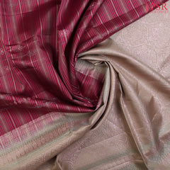 PSR Silk Sarees presents a Ruby Maroon Soft Silk Saree, beautifully complemented with an Olive Grey combination.