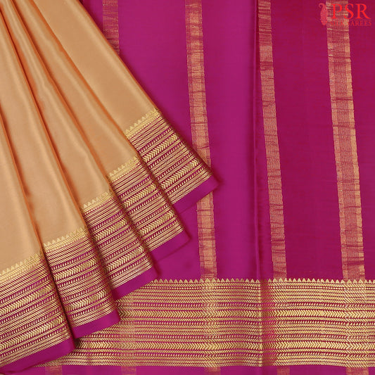 PSR Silks presents a Sandy Tan colored Mysore Silk saree with combination of Vadamalli Purple color.