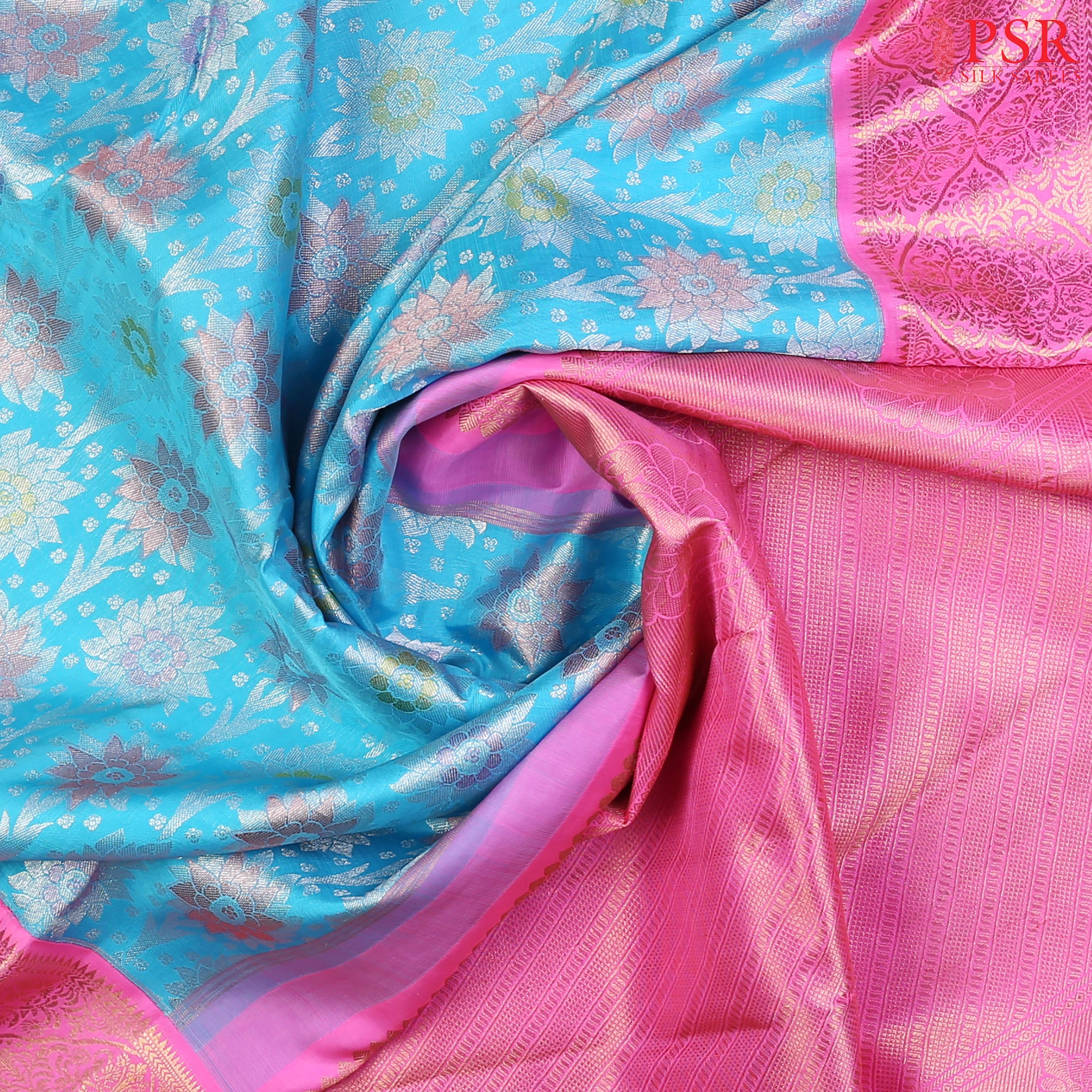 This stunning Sea Blue Summer & Fuchsia Pink Summer Kanchipuram Silk Saree crafted to perfection for brides who love a blend of tradition and charm