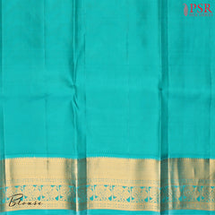 PSR Silks presents a Seance Purple Fancy Kanchipuram Silk Saree, elegantly paired with a striking Persian Green combination. A timeless blend of tradition and grace!