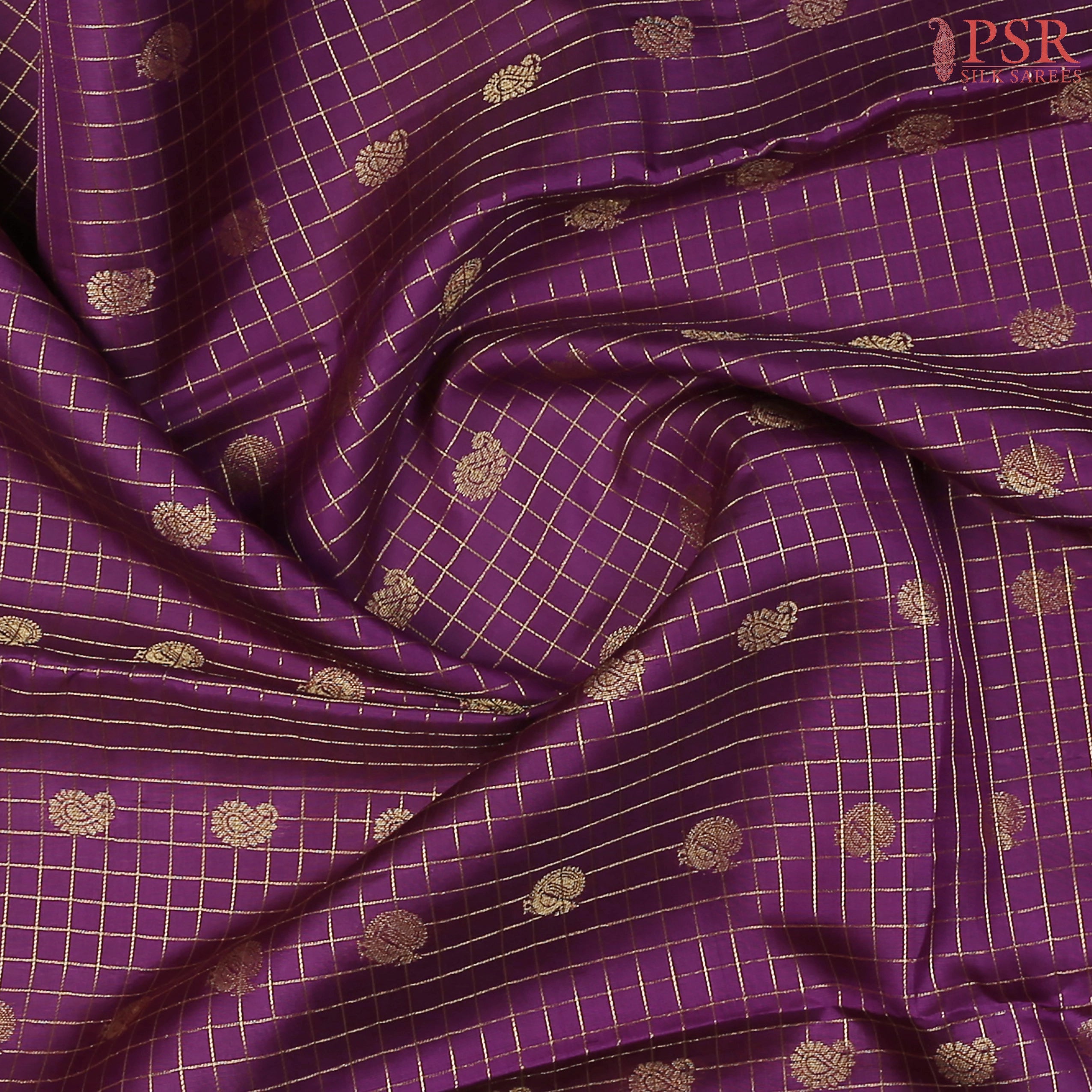 PSR Silks presents a Seance Purple Fancy Kanchipuram Silk Saree, elegantly paired with a striking Persian Green combination. A timeless blend of tradition and grace!