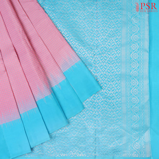 PSR Silks presents a Taffy Pink Fancy Kanchipuram Silk Saree, elegantly paired with a striking Turquoise Blue combination. A timeless blend of tradition and grace