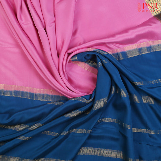 PSR Silks presents a Taffy Pink colored Mysore Silk saree with combination of Peacock Blue color.