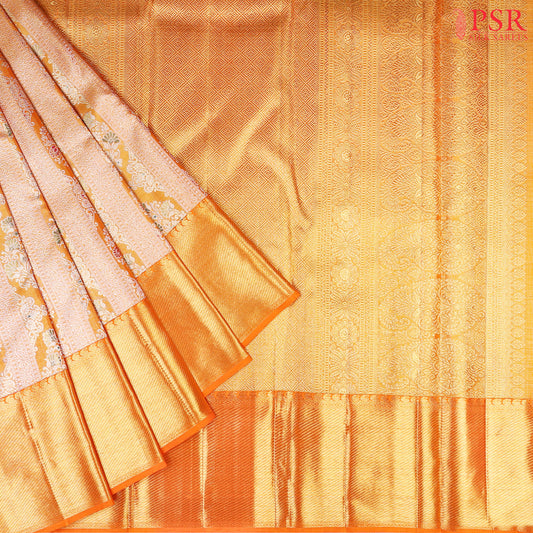 PSR Silk Sarees presents a stunning Tangerine Orange Kanchipuram Tissue Silk Saree, categorized under Bridal Kanchipuram