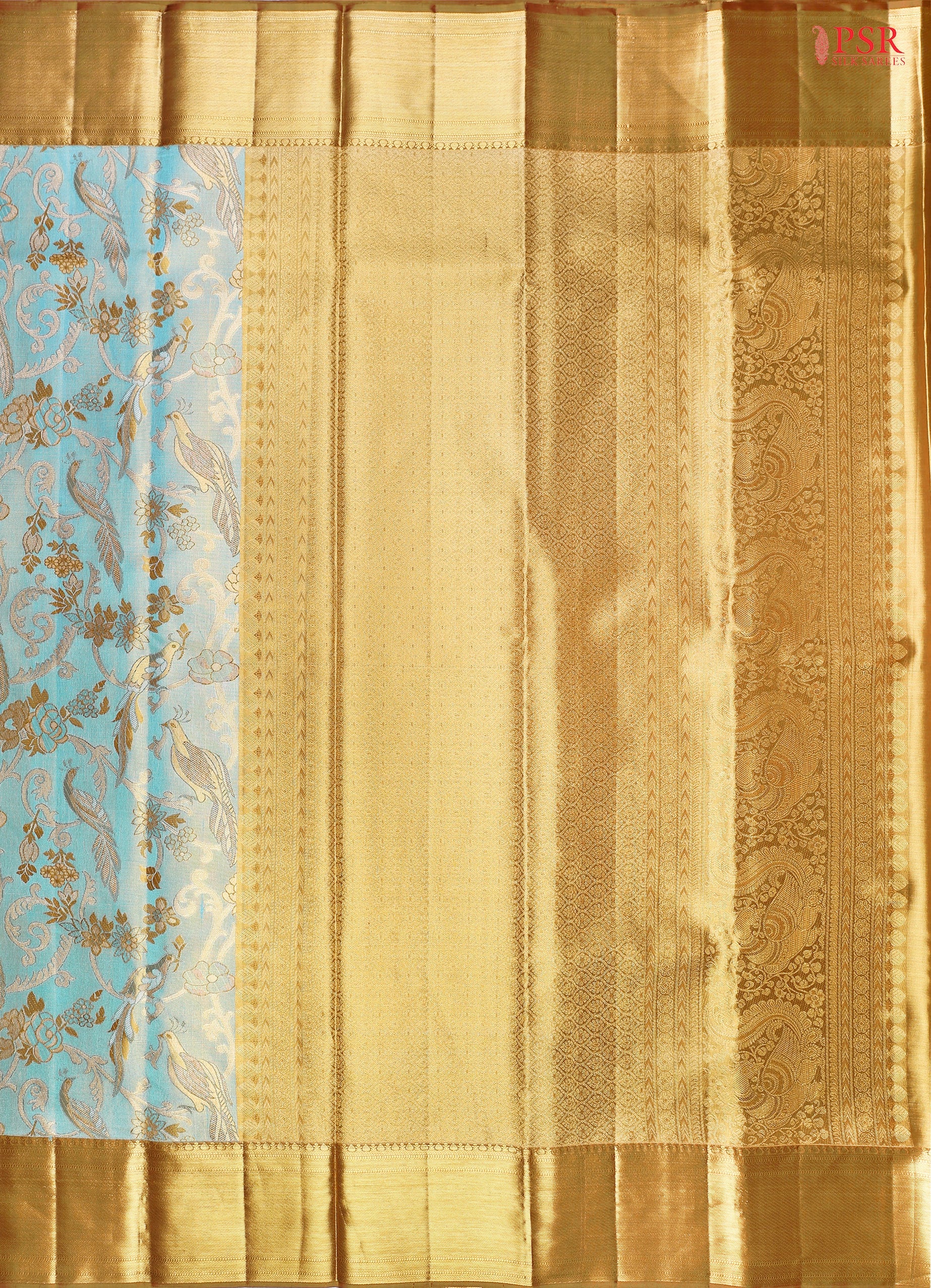 Turquoise Blue Kanchipuram Tissue Silk Saree with floral scroll zari weaves and bird motifs, paired with a Dark Mustard zari pallu, border, and tissue blouse.