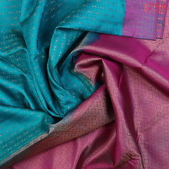 PSR Silks presents a Turquoise Cyan Fancy Kanchipuram Silk Saree, elegantly paired with a striking Purple combination. A timeless blend of tradition and grace