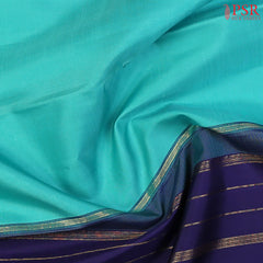 Turquoise Sea Green Kanchipuram Silk Saree with Traditional Zari Work Pallu & Border, Paired with a Plain Dark Blue Blouse – PSR Silks