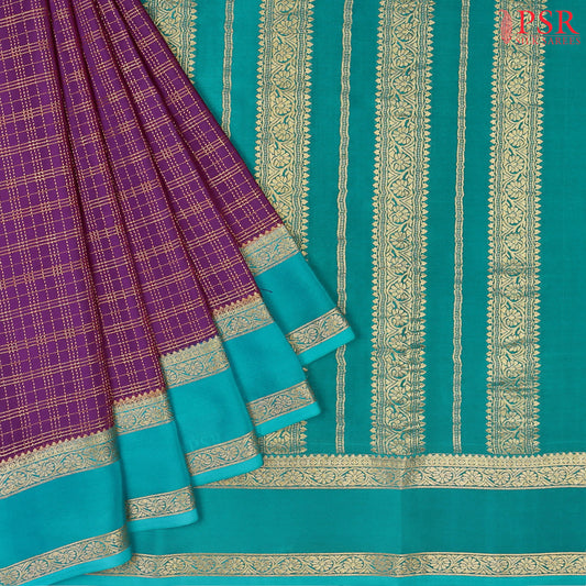 Step into elegance with PSR Silks' captivating Tyrian Purple Mysore Silk saree, paired with a striking Turquoise Cyan combination!