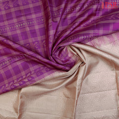 Unveil Timeless Beauty with PSR Silks! Presenting a captivating Vadamalli Purple Soft Silk Saree, paired elegantly with a sophisticated Ecru Grey. 