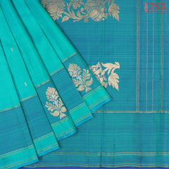 This Verdigris & Turquoise Blue Arani Silk Saree from PSR Silk Sarees is a refined blend of tradition and elegance