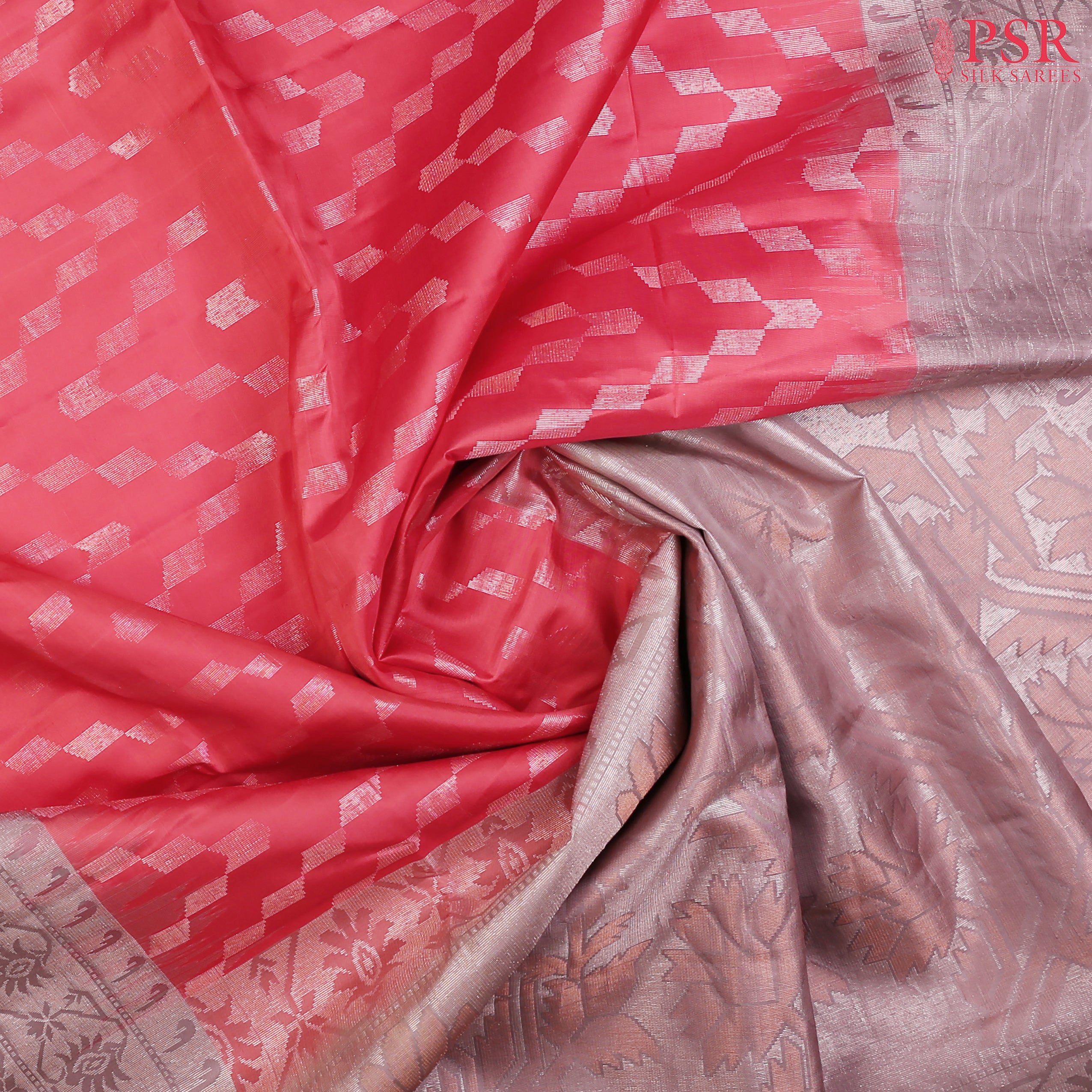 Drape yourself in the luxurious charm of our Vermilion Red Soft Silk Saree, beautifully complemented by a Mauve Blush combination. 