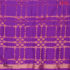 Indulge in timeless elegance with our Vivid Purple&nbsp;Soft Silk Saree, crafted to perfection with&nbsp;impressive copper zari jacquard stripes patterm. 