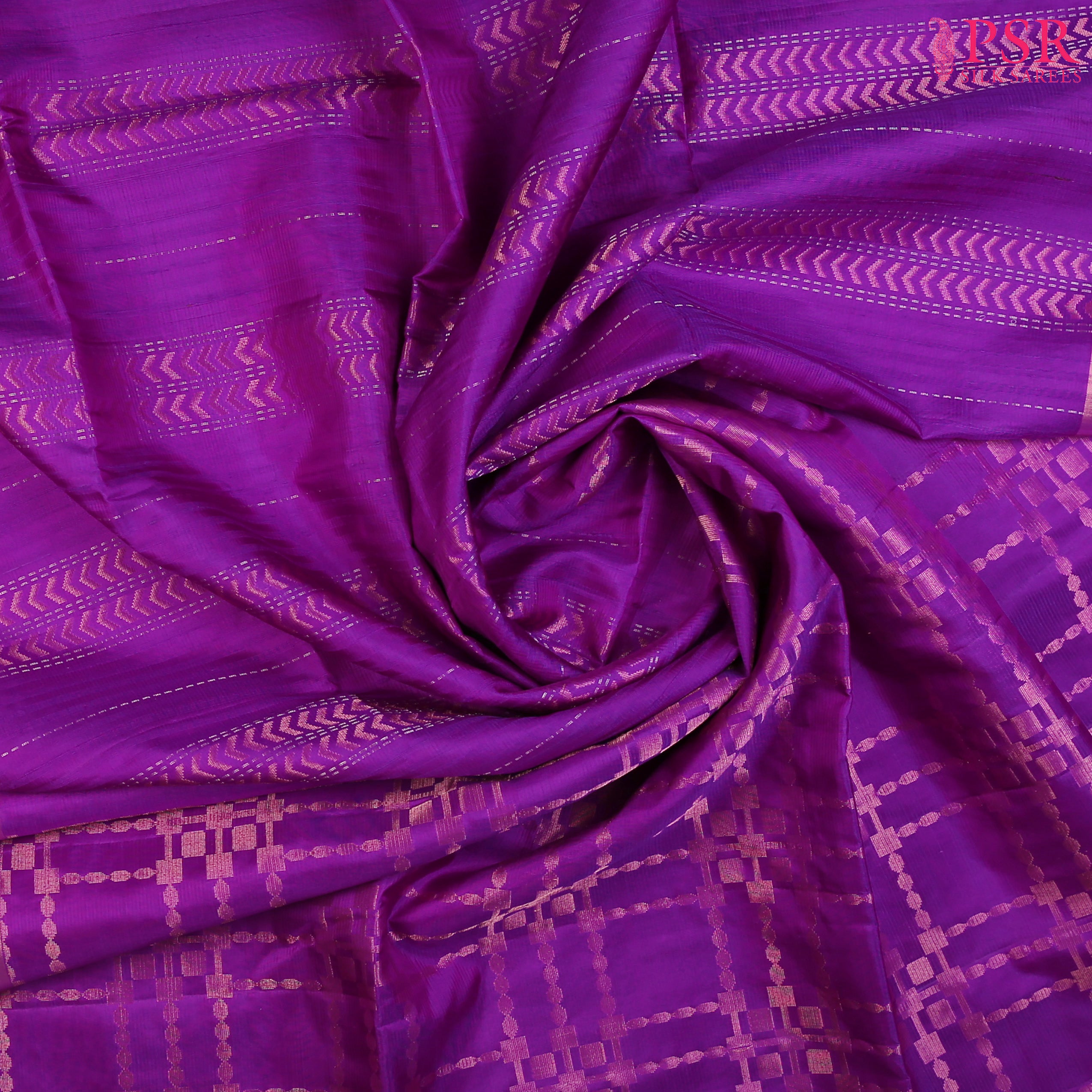 Indulge in timeless elegance with our Vivid Purple&nbsp;Soft Silk Saree, crafted to perfection with&nbsp;impressive copper zari jacquard stripes patterm. 