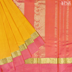 🌼 Radiate Joyful Elegance with PSR Silks! 🌼 Presenting a vibrant Yellow Arani Silk Saree beautifully complemented by Rouge Pink accents.