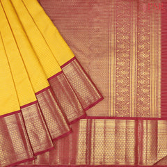 This Yellow & Maroon Kanchipuram Silk Saree from PSR Silk Sarees is a captivating addition to the Vaichitraya Kanjivaram collection