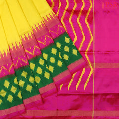 This Yellow &amp; Magenta Pink Pochampally Silk Saree from PSR Silk Sarees is a radiant blend of tradition and elegance.