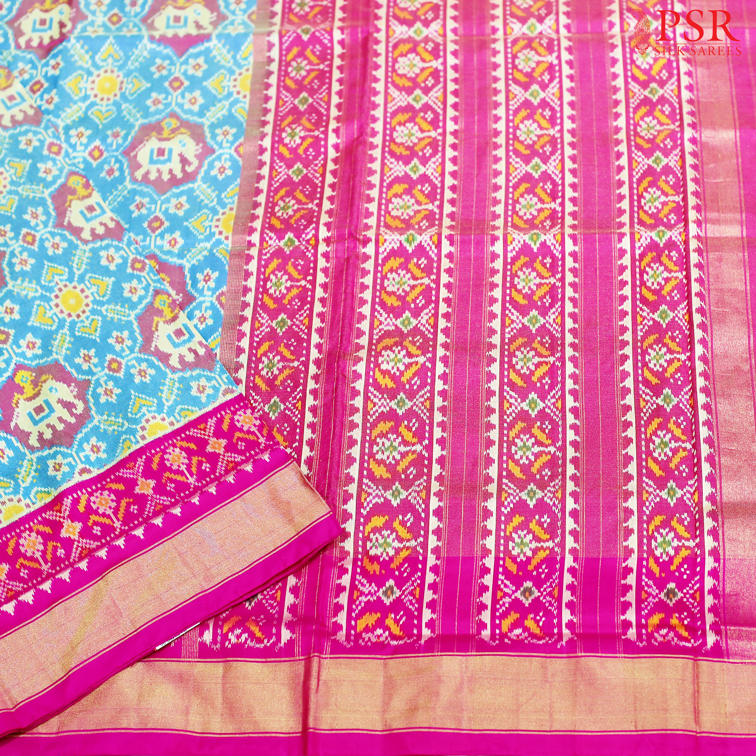 PSR Silks Presents Cerulean Blue Colored Authentic Pochampally Silk Saree With Combination Of Fuchsia Pink Color.